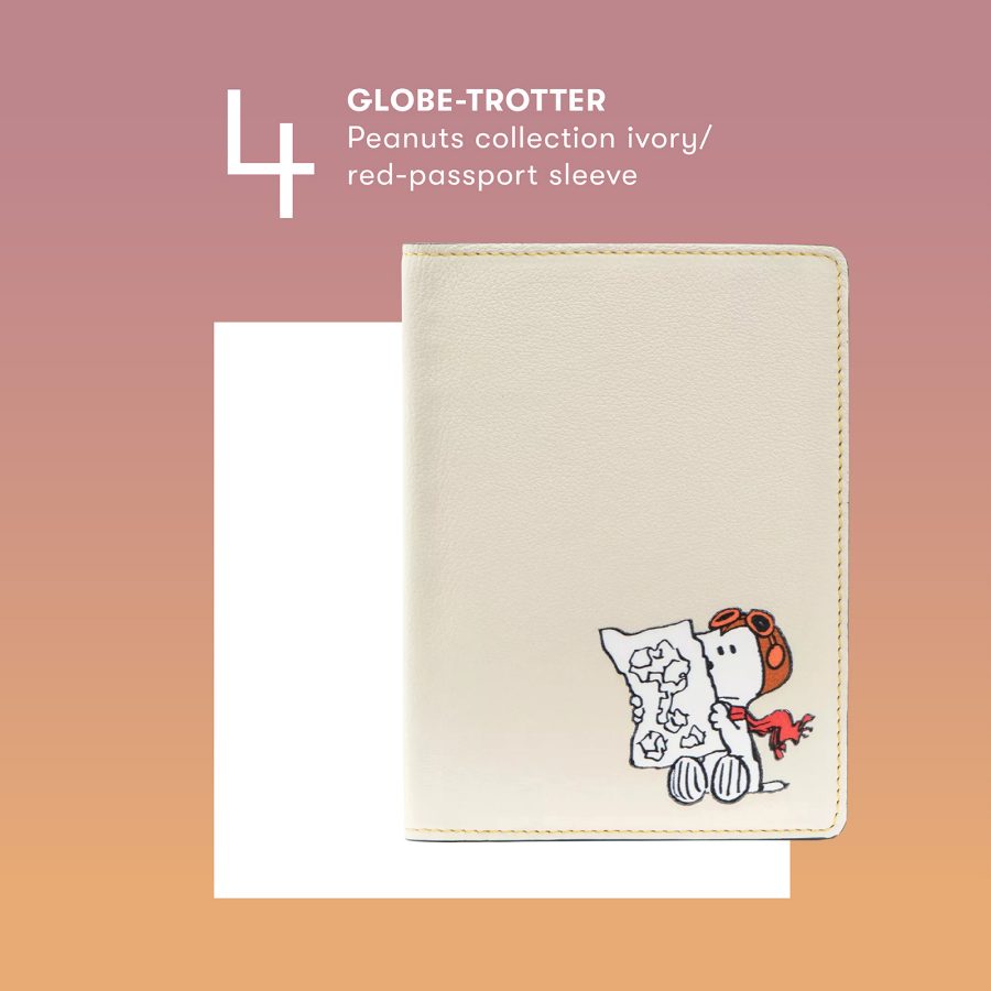 Product shot of the GLOBE-TROTTER Peanuts collection ivory/red-passport sleeve.